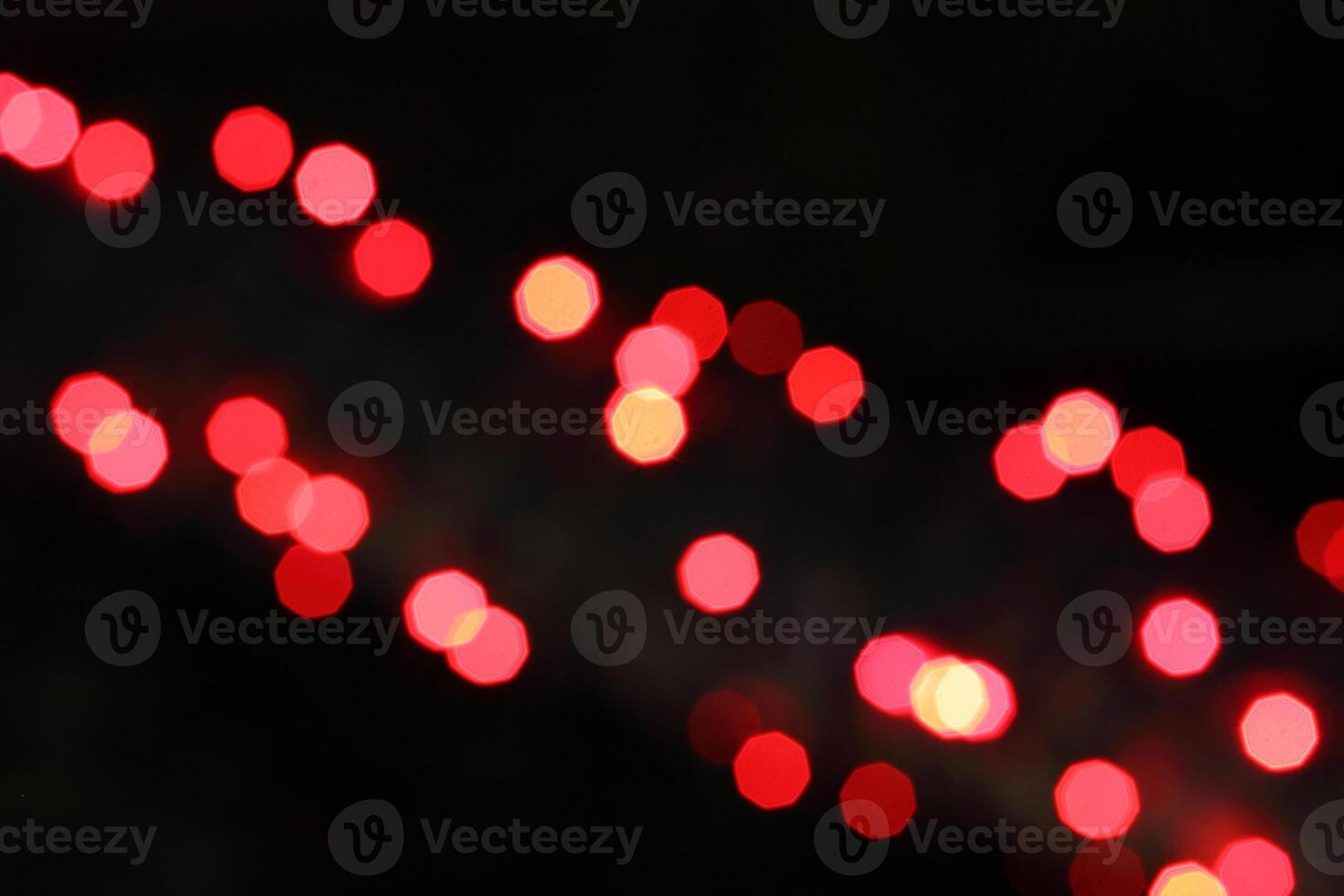 colorful and defocused lights on black background photo