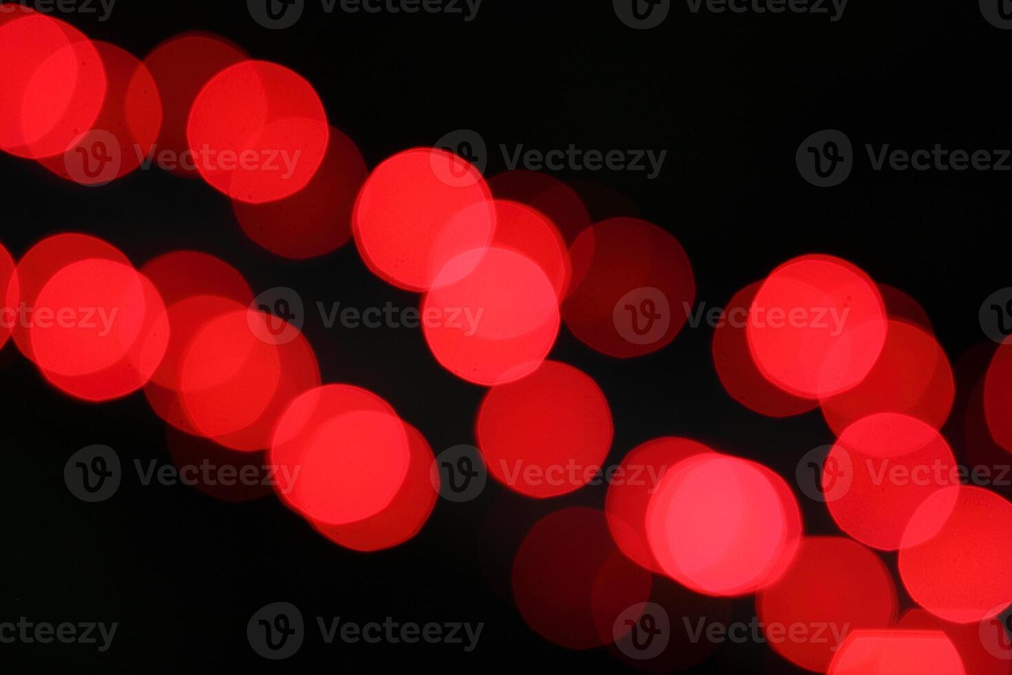 colorful and defocused lights on black background photo