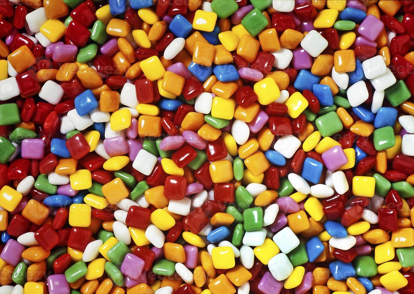 texture of small colorful square chewing gum close up photo