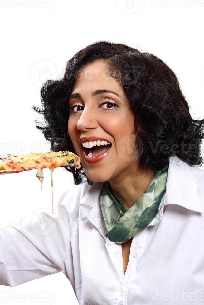 smiling brunette model with her piece of pizza photo