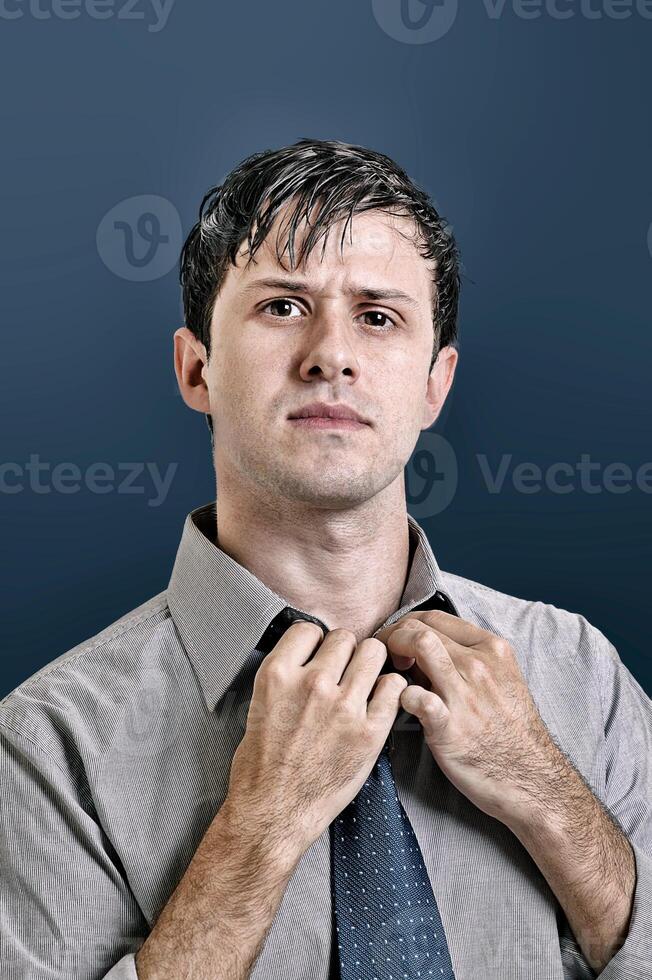young man with beard in different situations on neutral background photo