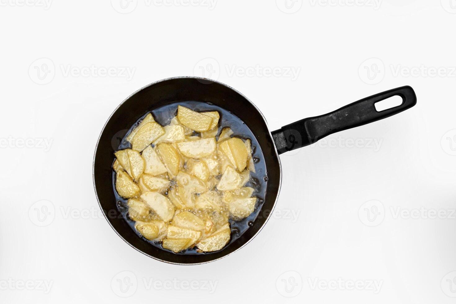 step by step of Tortilla de Patata, classic Spanish dish with eggs, potatoes, chopped chives and salt photo