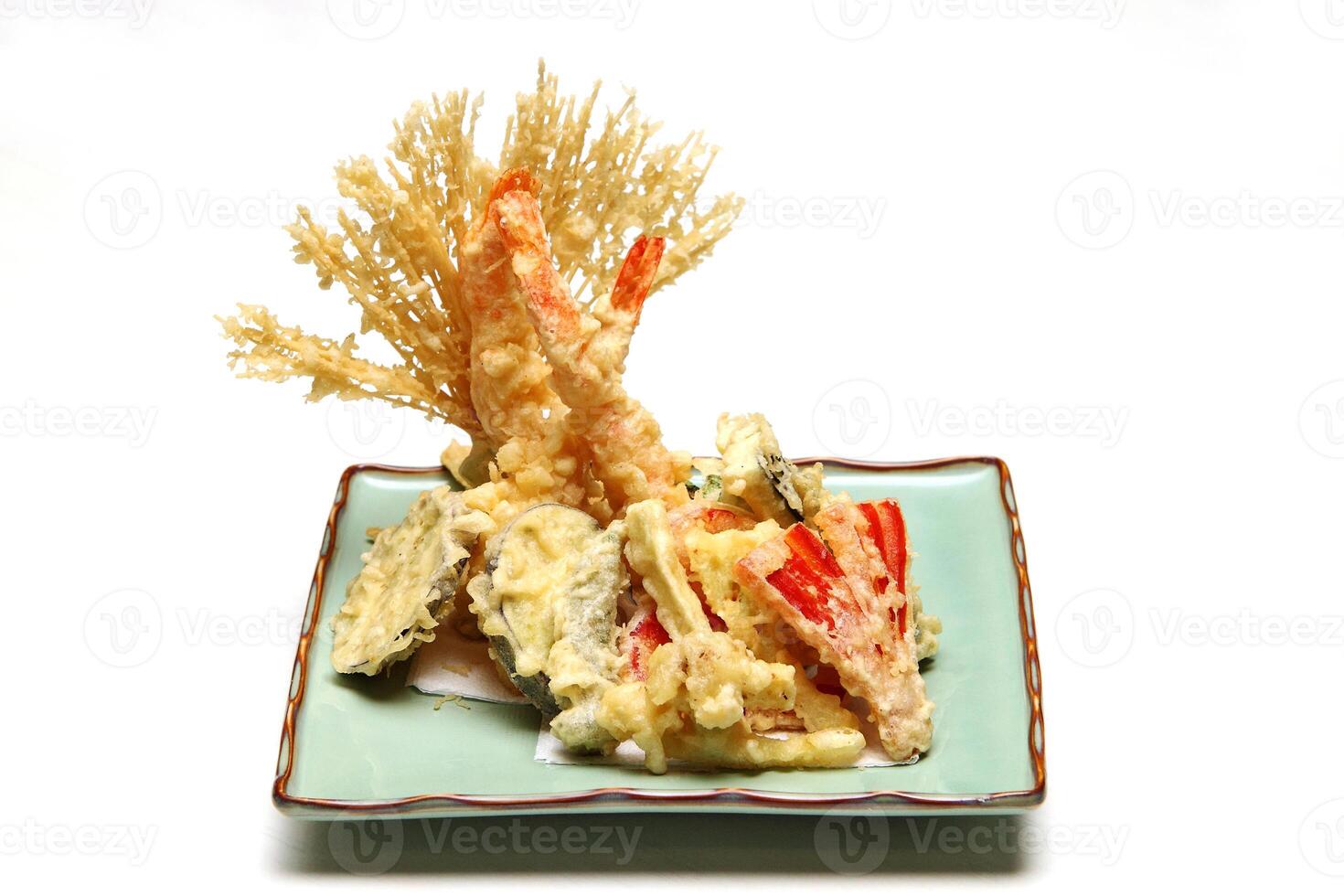 Shrimp and vegetable tempura, typical Japanese dish with breaded and fried shrimp and vegetables photo
