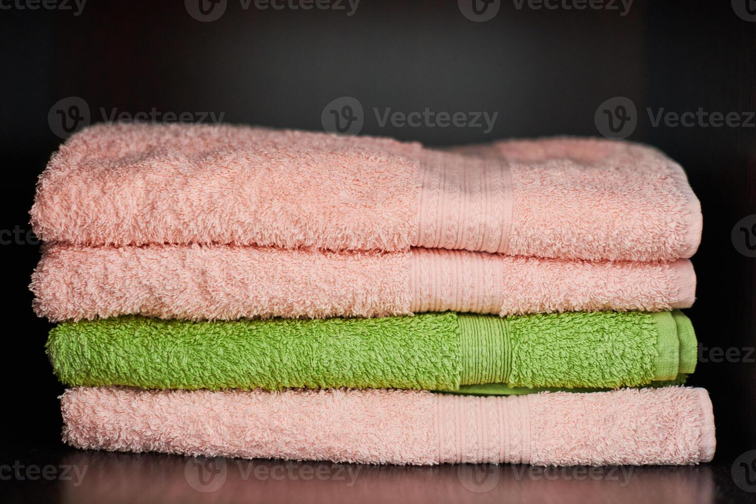 Towels stack on shelf photo