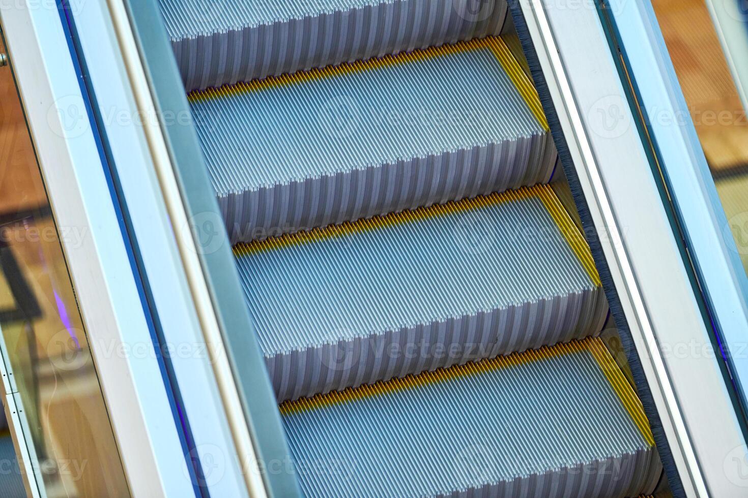Escalators in shopping center photo