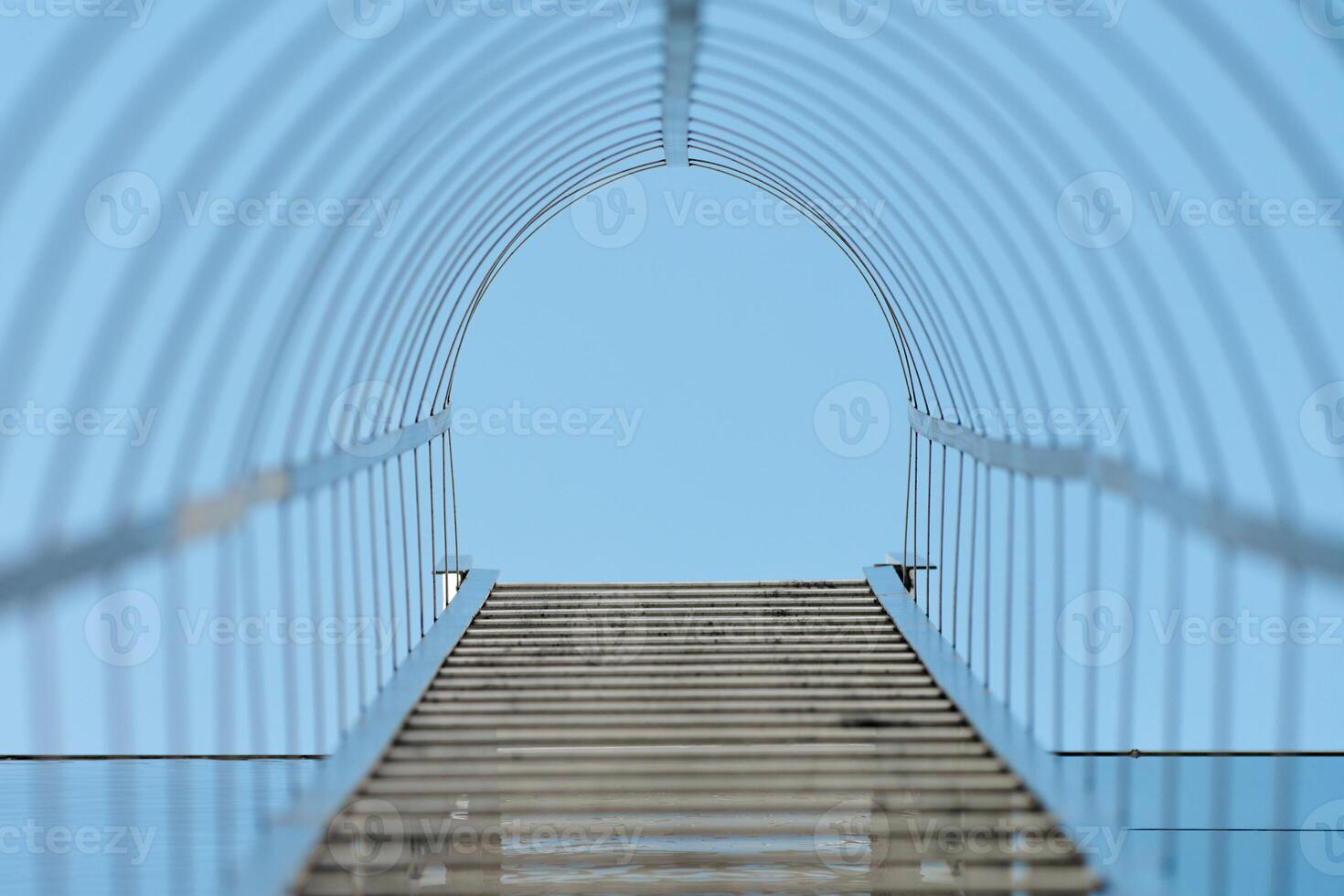 Fire escape staircase, emergency fire exit, bottom view photo