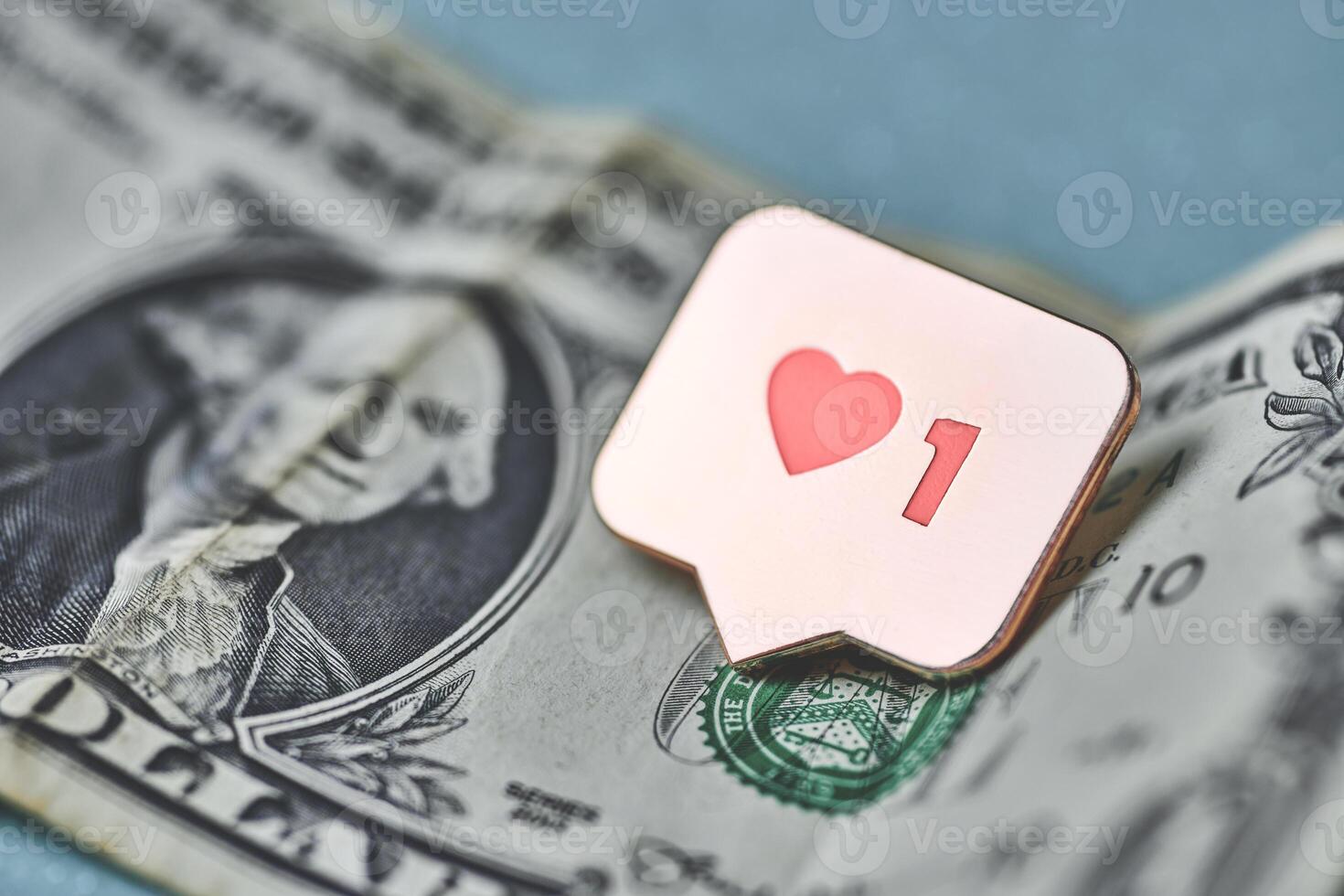 Like heart symbol on dollar photo