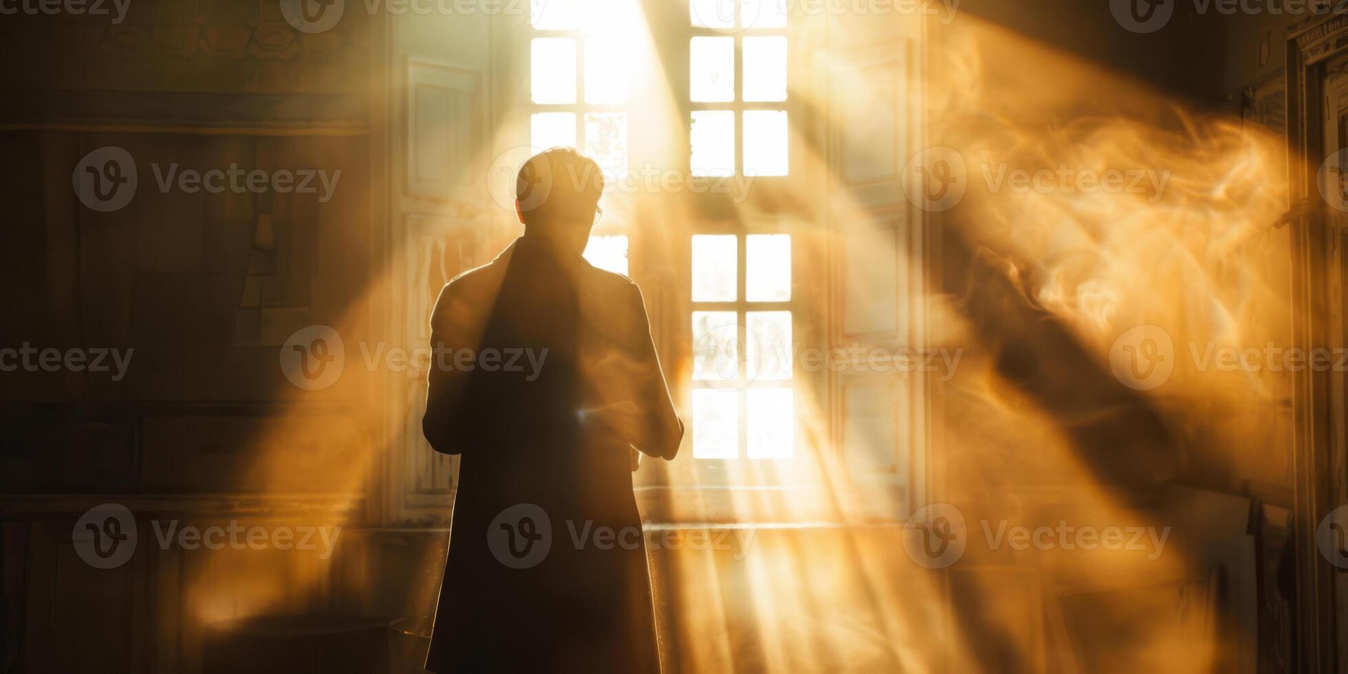 Silhouette in Sunbeams - A Mystical Figure Amidst Light Rays photo