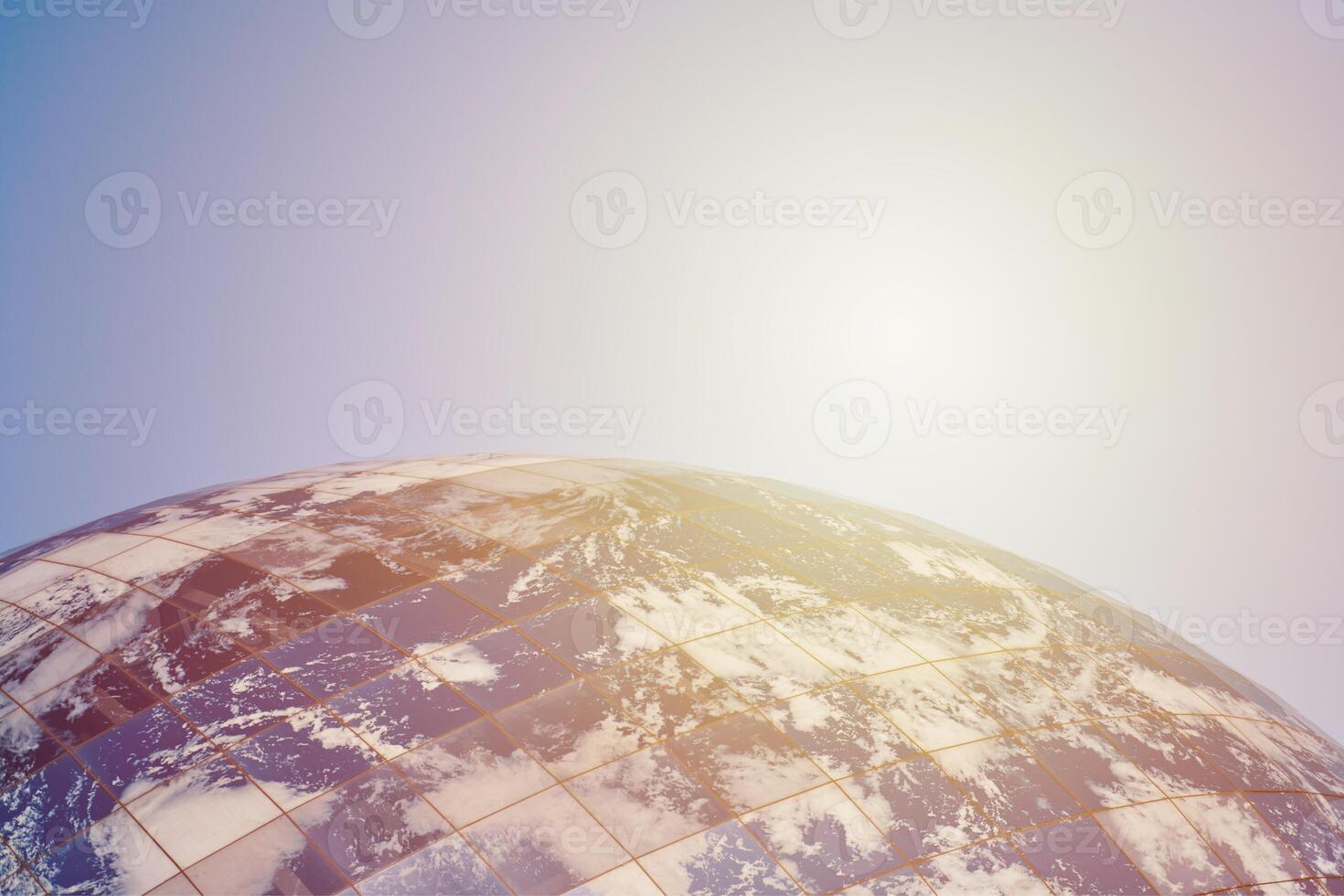 Earth planet modern building with clouds and blue sky in sunlight, ecological architectural concept photo