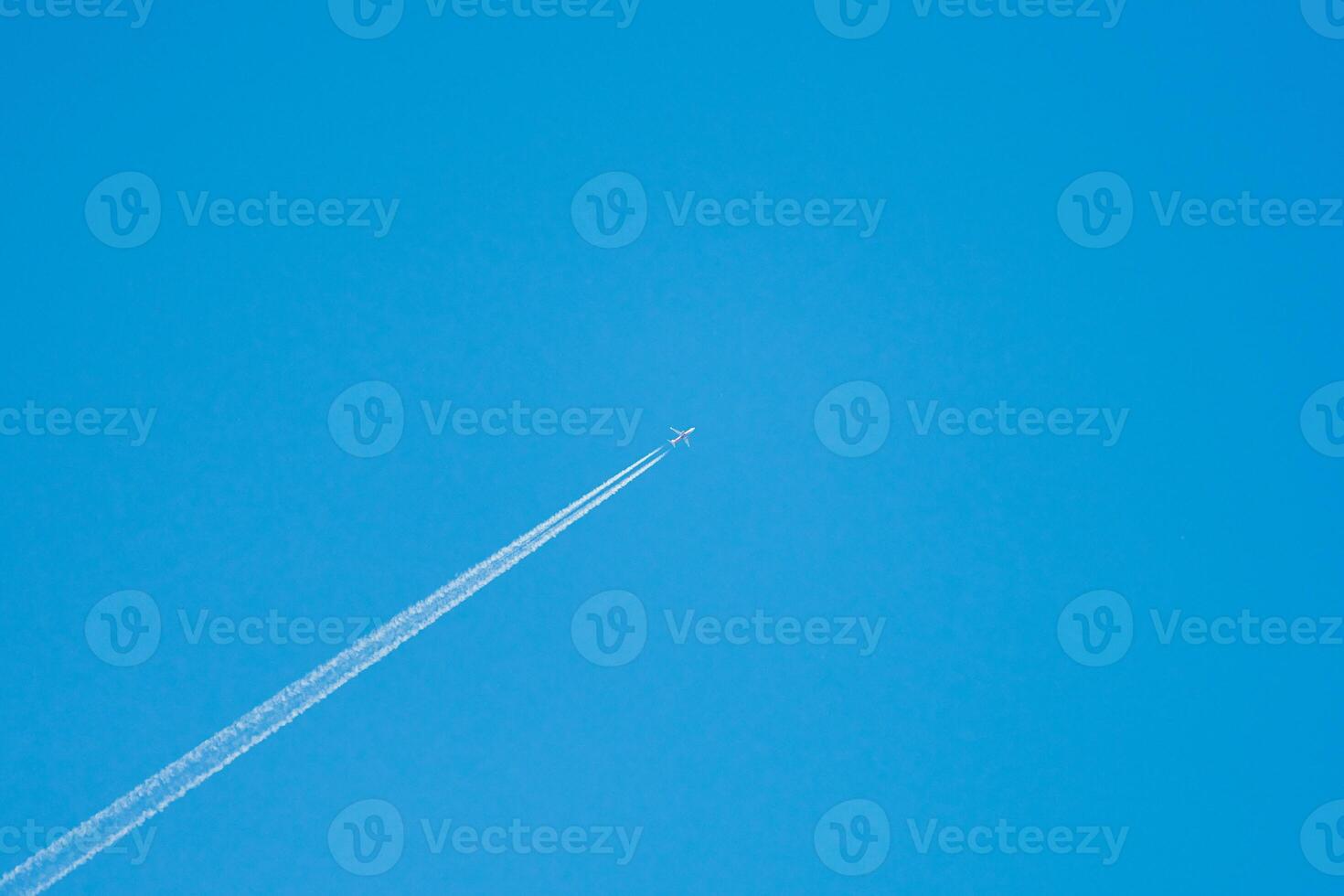 Airplane in sky, centered. photo