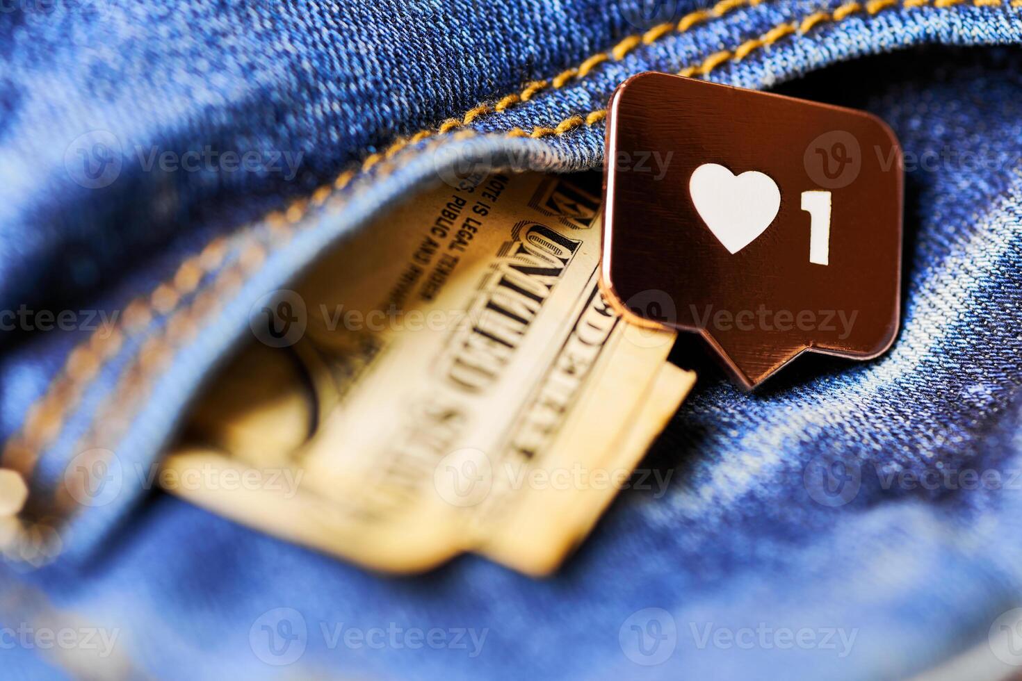 Like heart symbol and dollar in jeans pocket photo