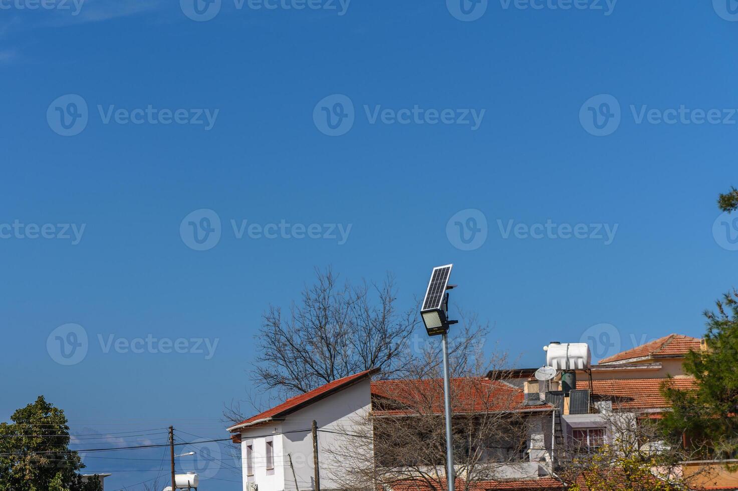 solar-powered street lighting floodlight against the sky 3 photo