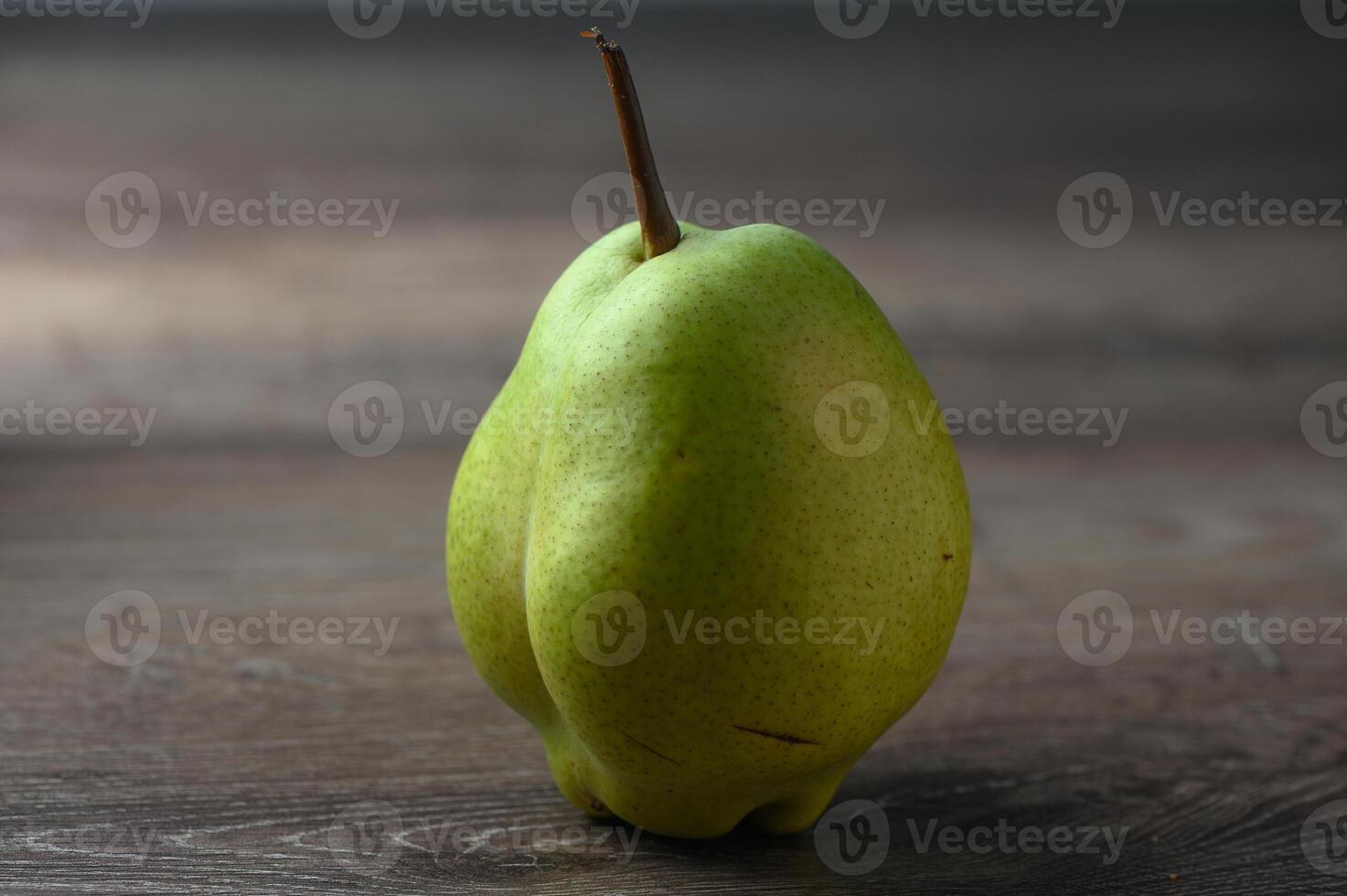 juicy pear on a wooden table 3 photo