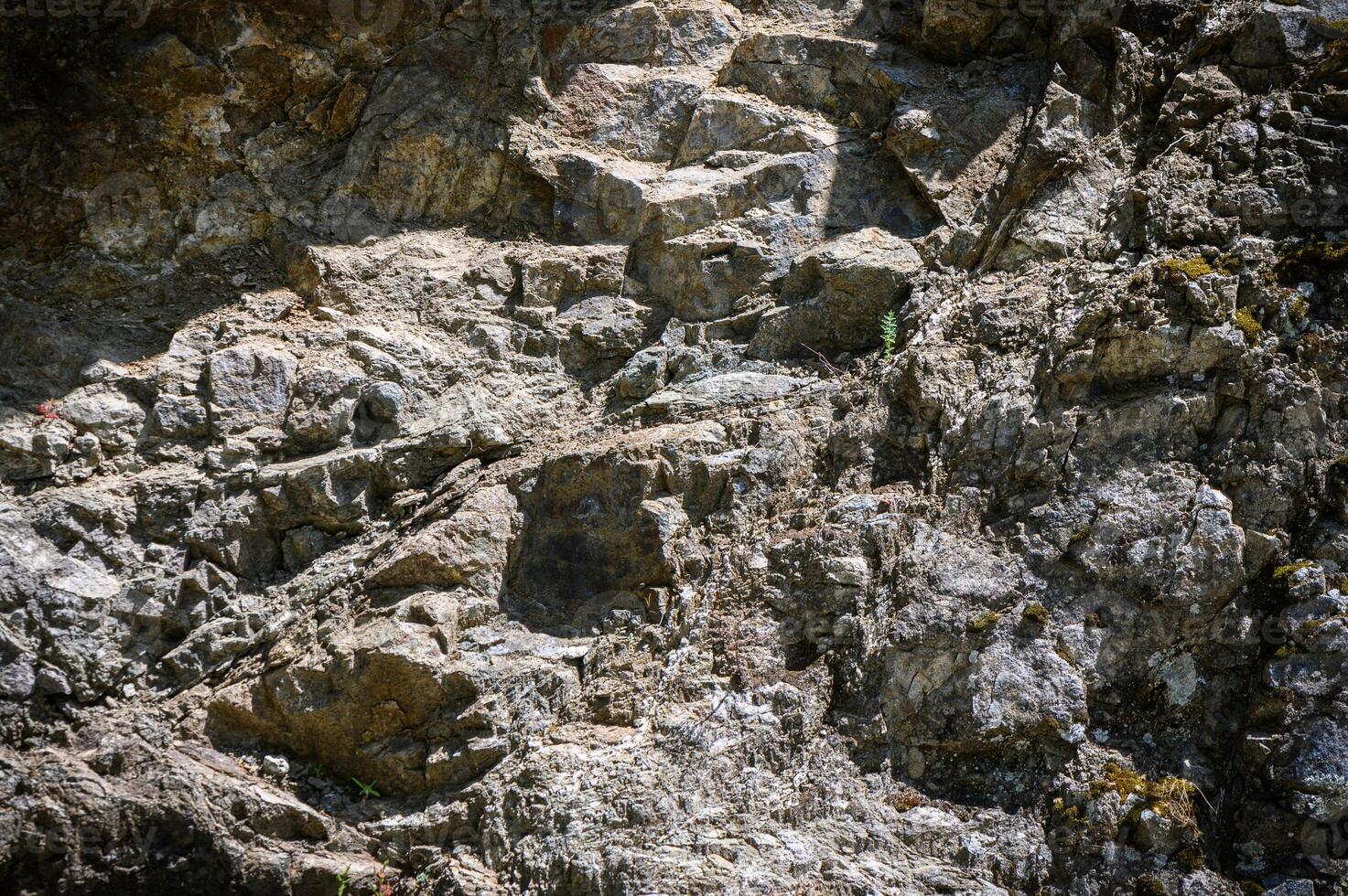 Close-up. Dark gray stone basalt background for design. Banner. 1 photo
