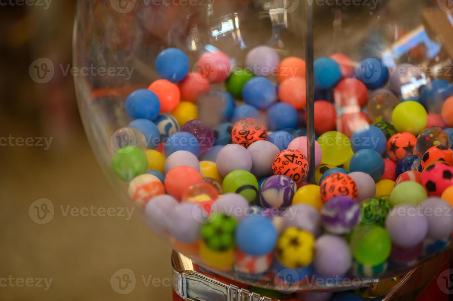 colored balls in a glass ball in a store 1 photo