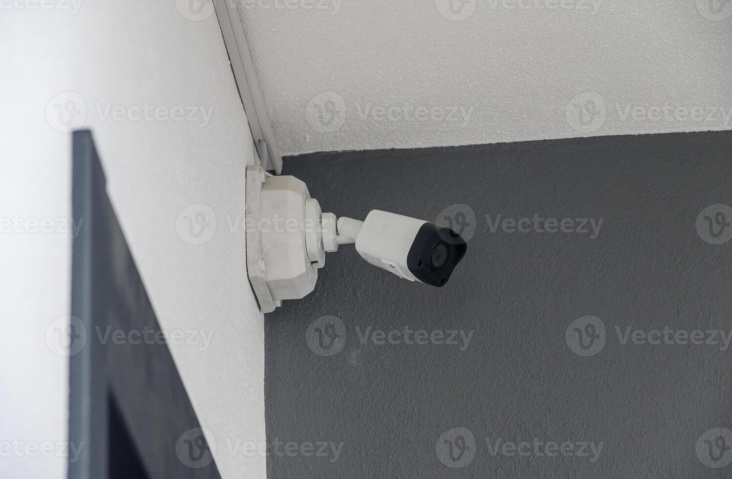 An IP CCTV camera is mounted outside the house for remote monitoring of its owners safety and to potentially save lives photo