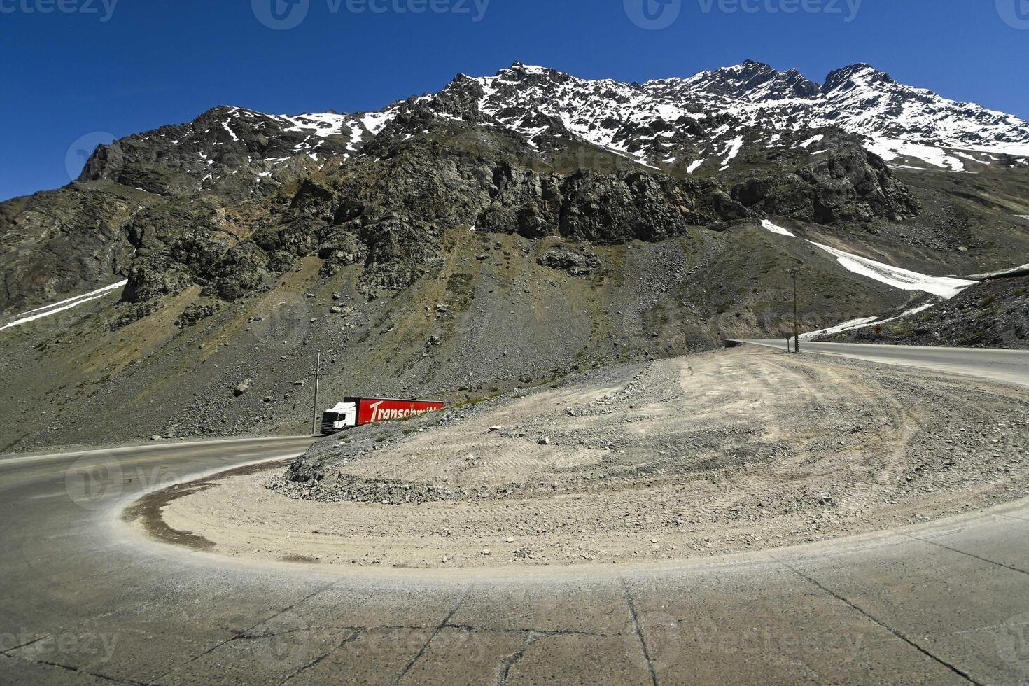 Los Caracoles desert highway, with many curves, in the Andes mountains photo