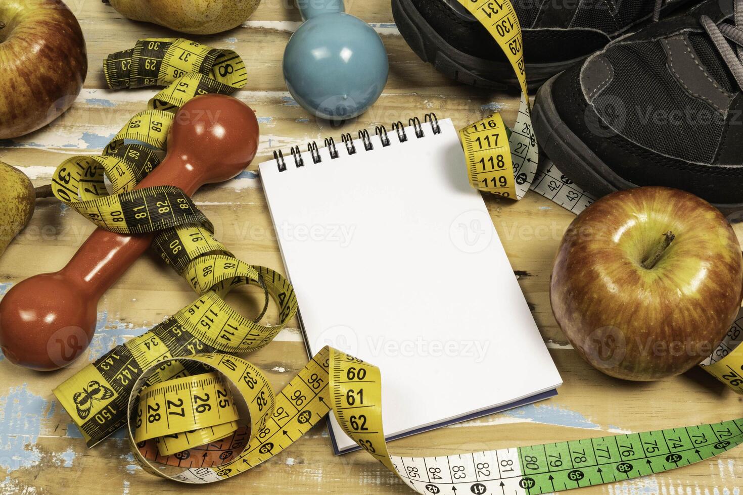 fruit for weight loss with measuring tape and equipment for exercise and diet, weight loss photo