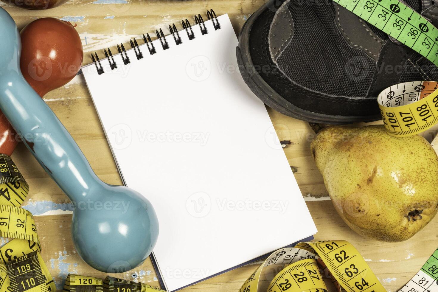 fruit for weight loss with measuring tape and equipment for exercise and diet, weight loss photo