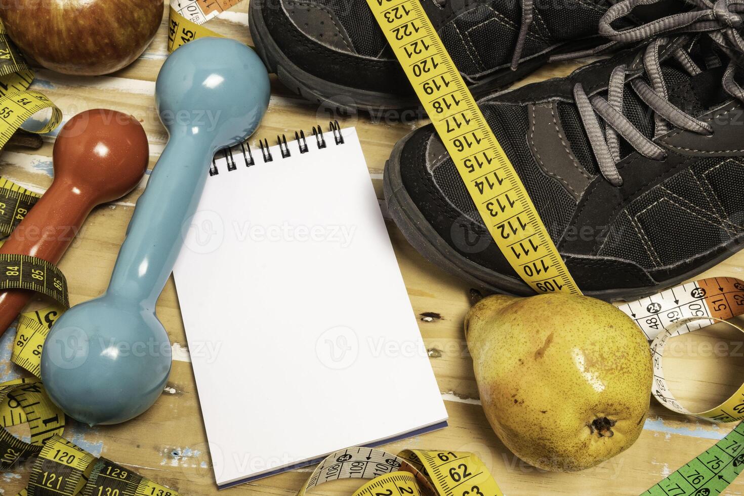 fruit for weight loss with measuring tape and equipment for exercise and diet, weight loss photo