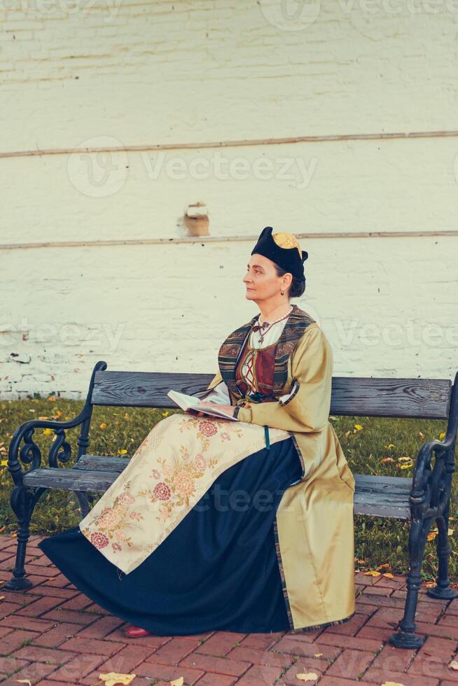 Portrait of woman dressed in historical Baroque clothes photo