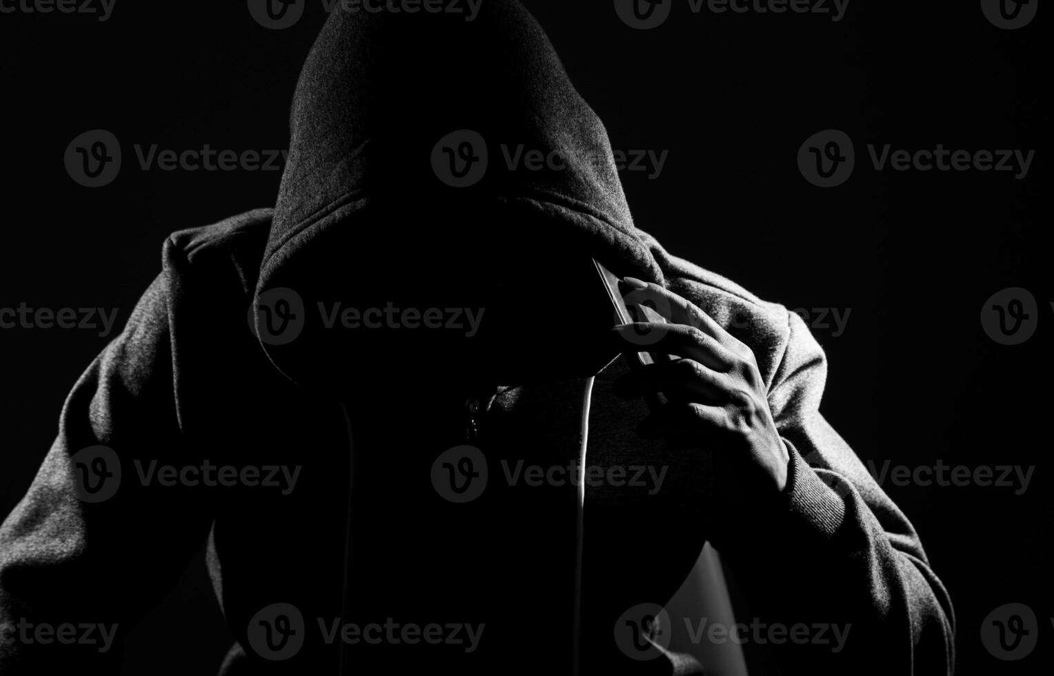 Scammer Using Smartphone to make call. photo