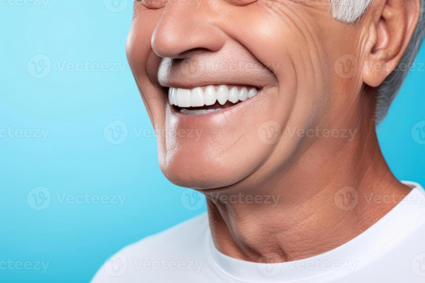 a man with white teeth smiling photo