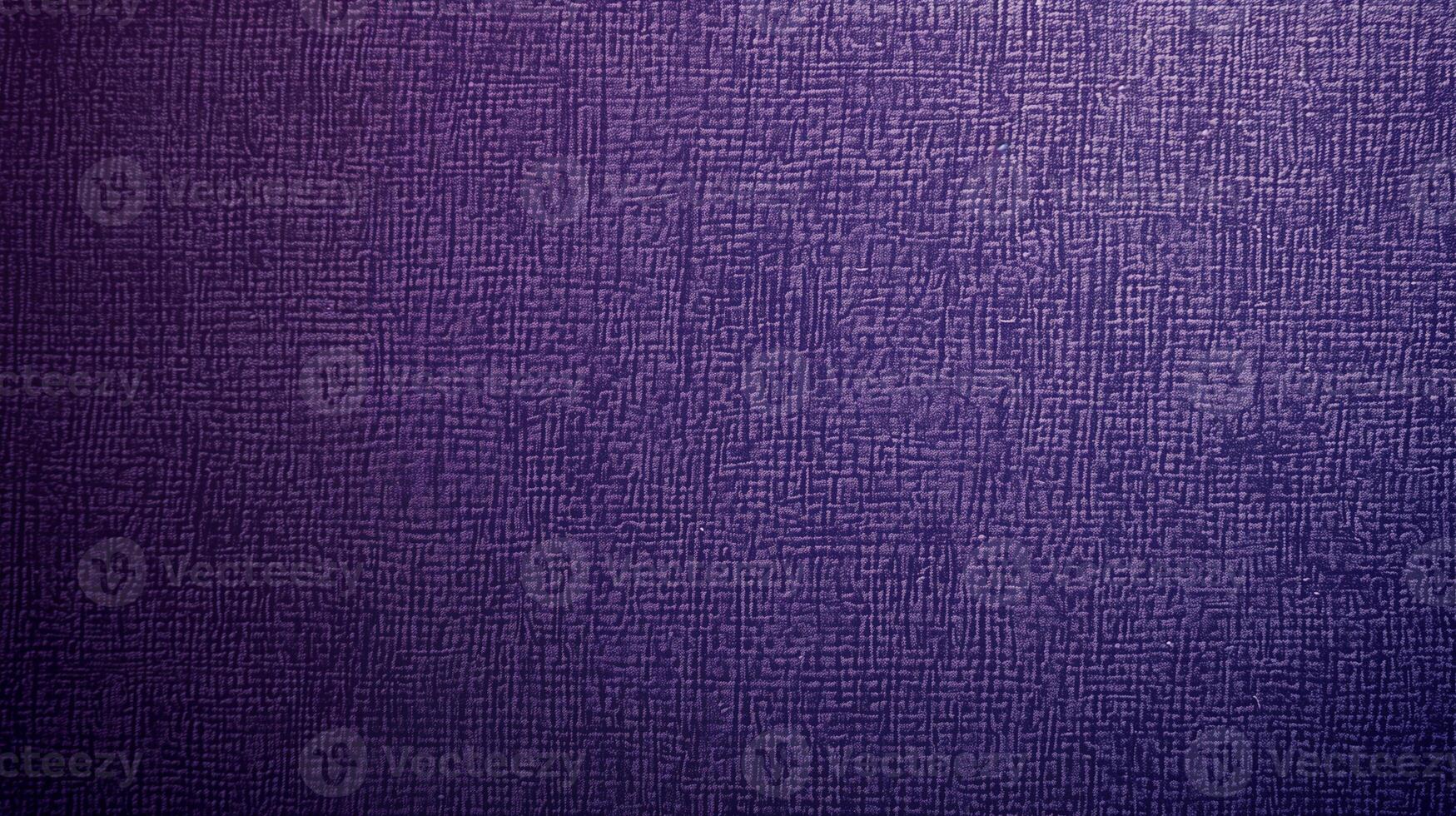 Textured purple fabric background. Detailed texture of a purple fabric with a subtle pattern and weave visible. photo