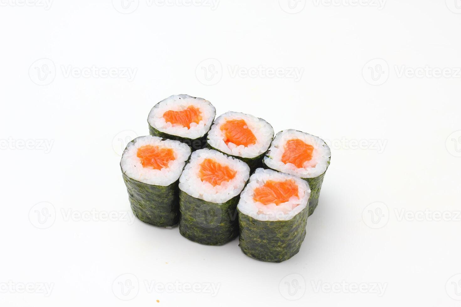 Sushi delivery. Set of rolls in a disposable box on a black background. Top view photo