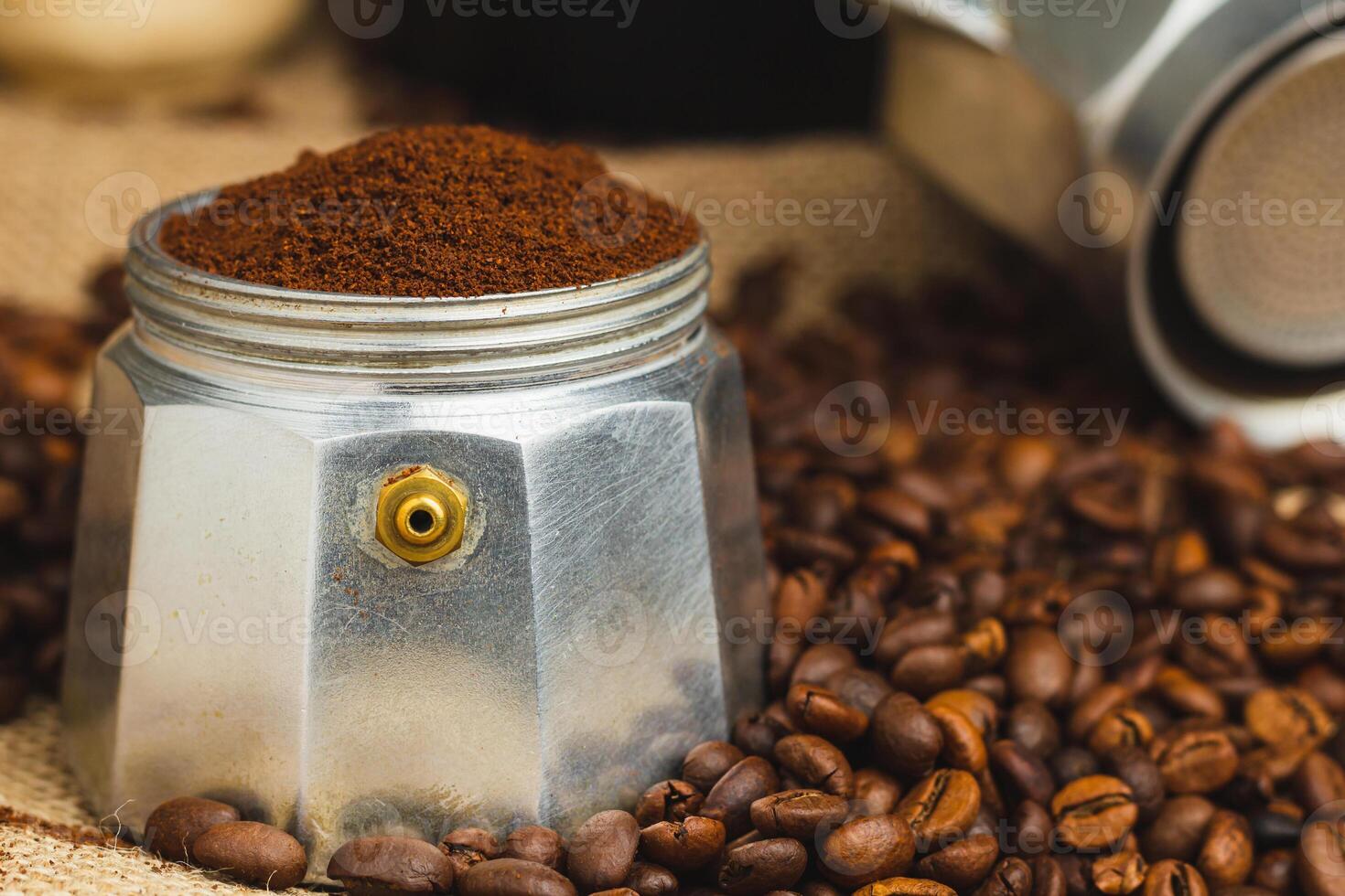 Natural freshly ground aromatic coffee in a geyser coffee maker for breakfast. World Coffee Day. Close-up. Selective focus. photo