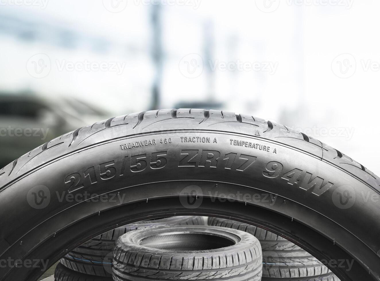 New tires in a tire shop or car service center , Car tire maintenance and servicing concept photo