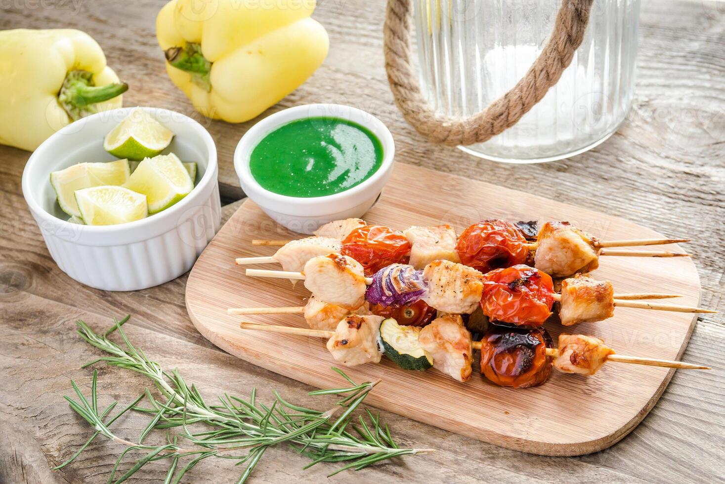 Grilled chicken skewers with zucchini and cherry tomatoes photo