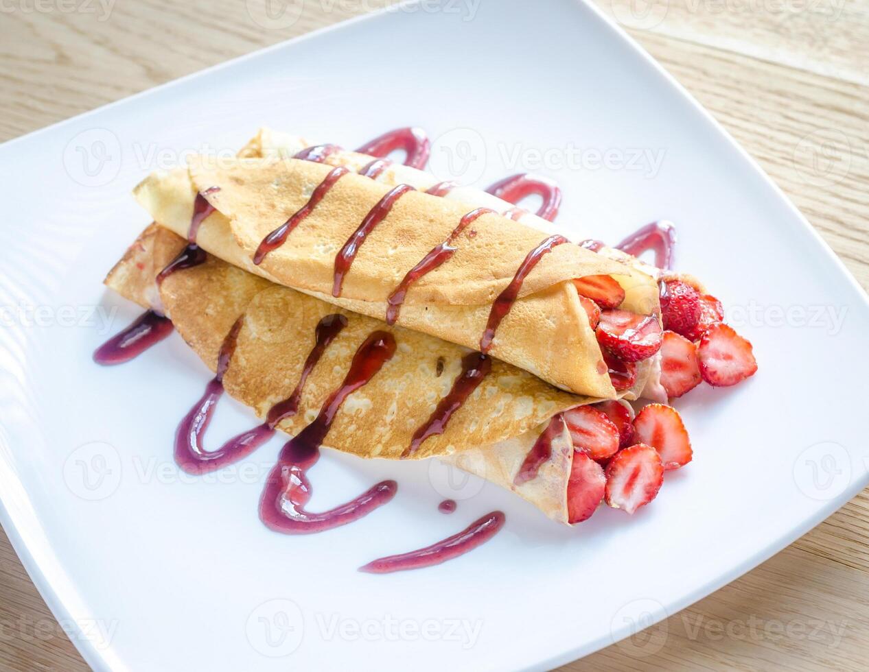Crepes with fresh strawberries photo