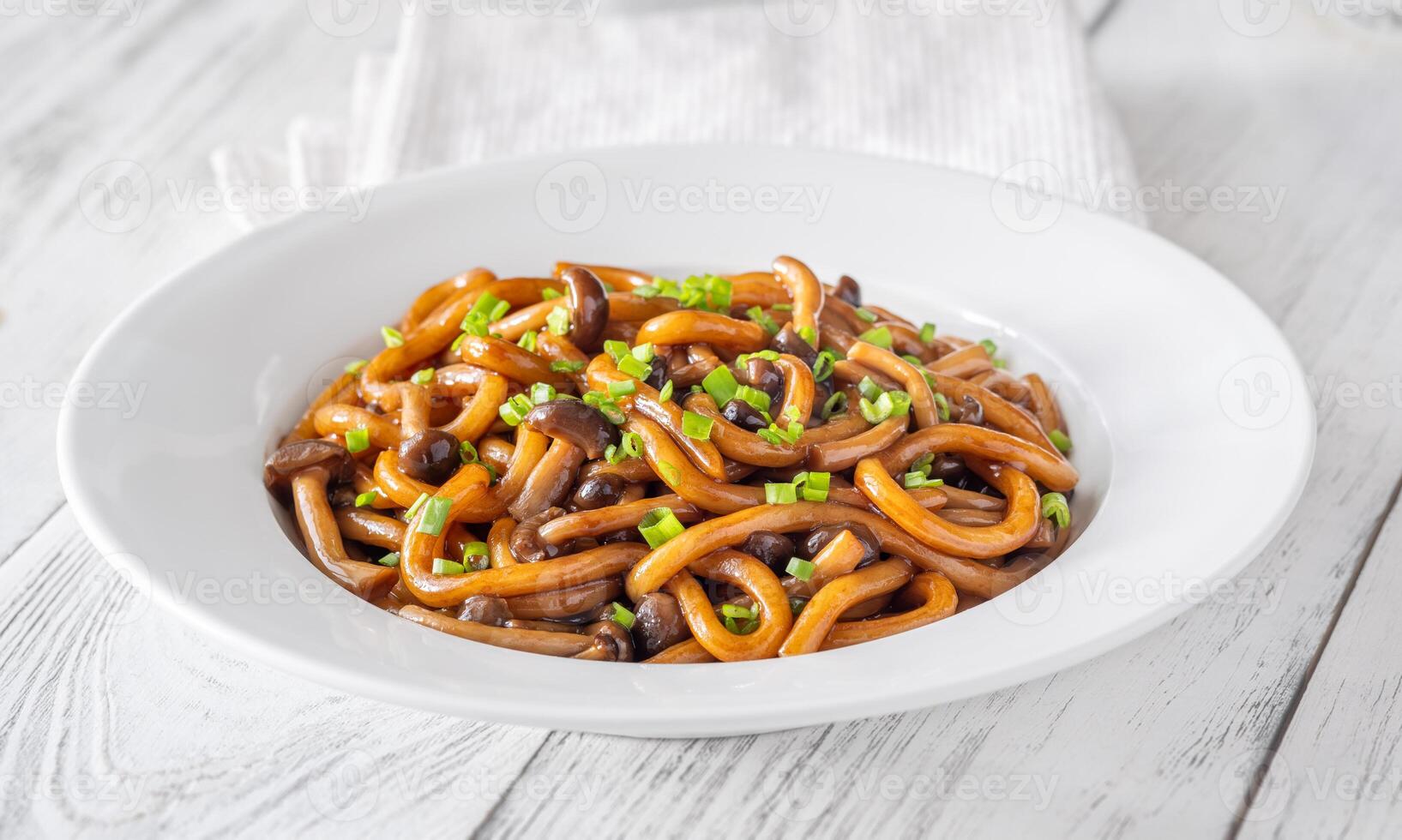 Udon noodles with mushrooms photo