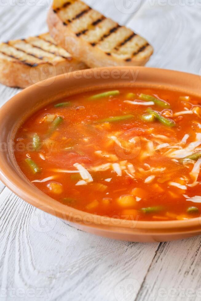 Portion of Minestrone soup photo