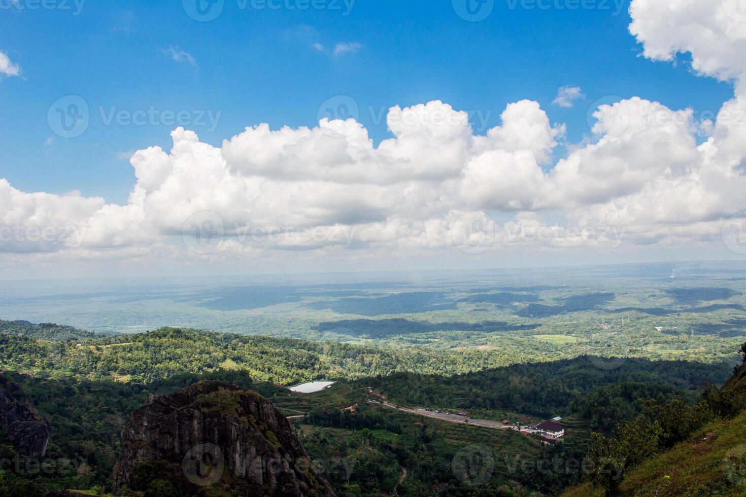 collection of clouds in blue sky in summer with mountain view. photo