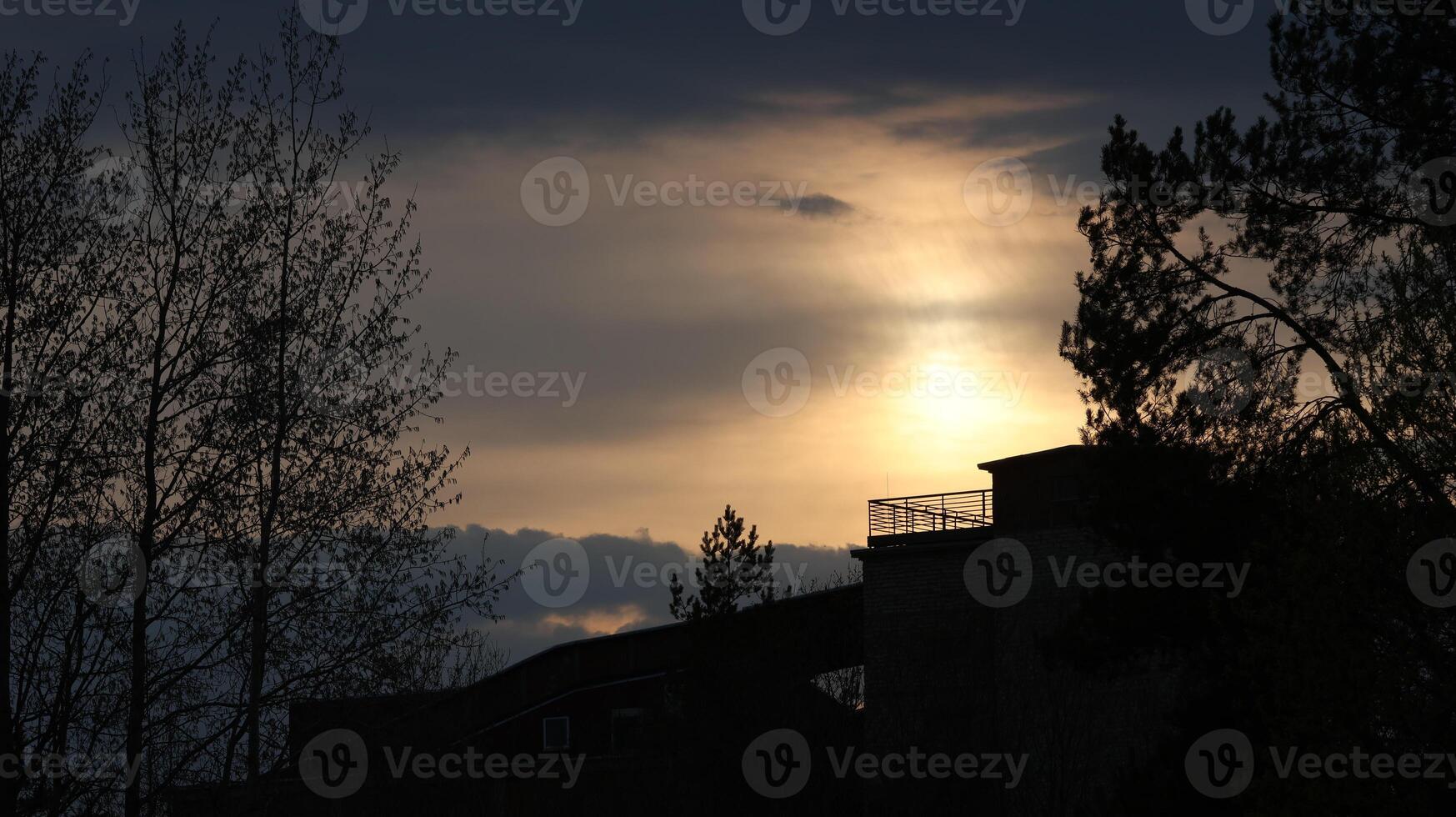 Drama sunset with bright sun photo