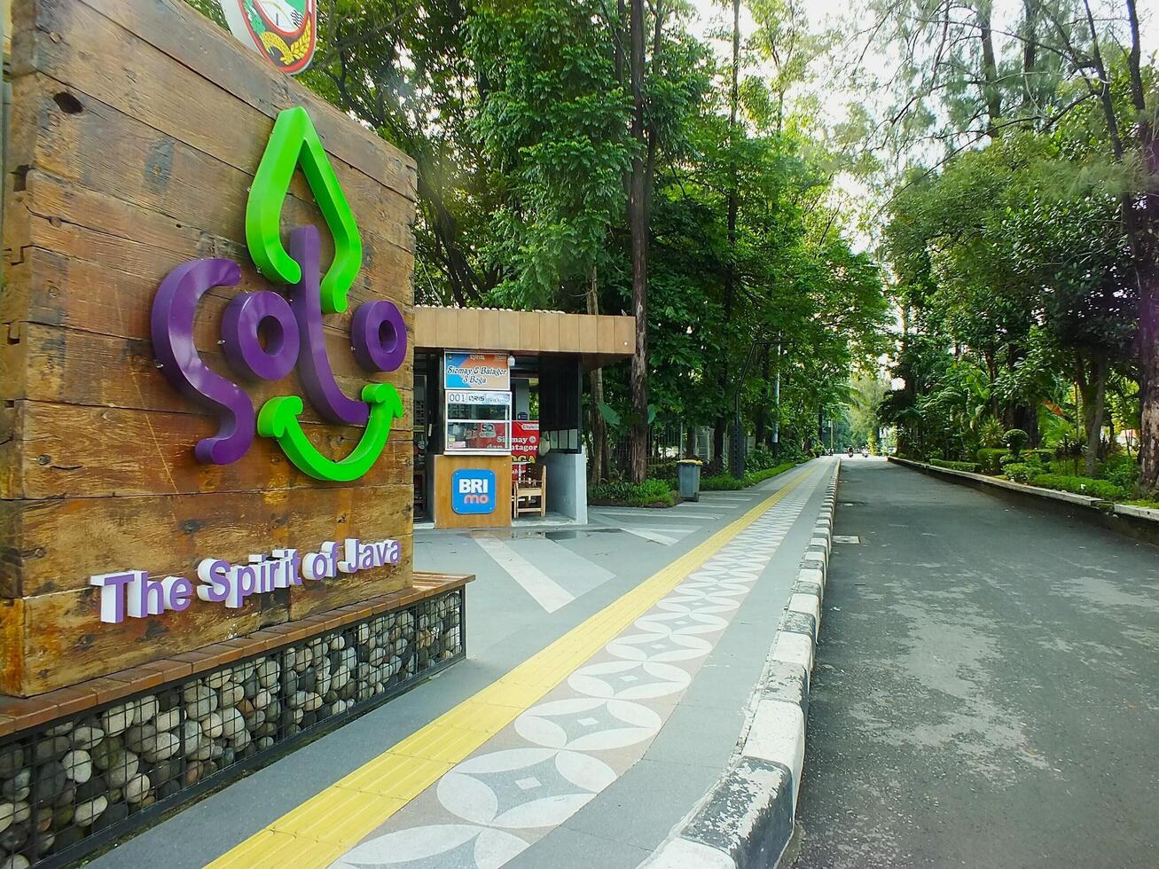 Surakarta, April 11 2024, quiet streets with lush trees and other public facilities around Manahan Stadium. photo