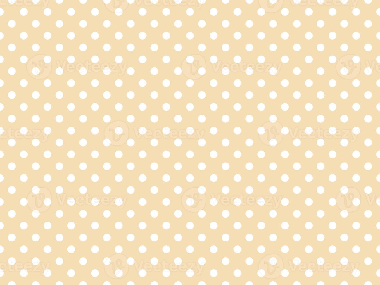 white polka dots over wheat background photo