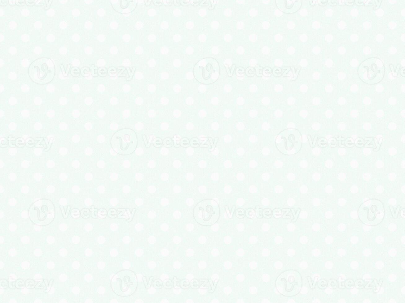 texturised white color polka dots over mint cream off white back photo