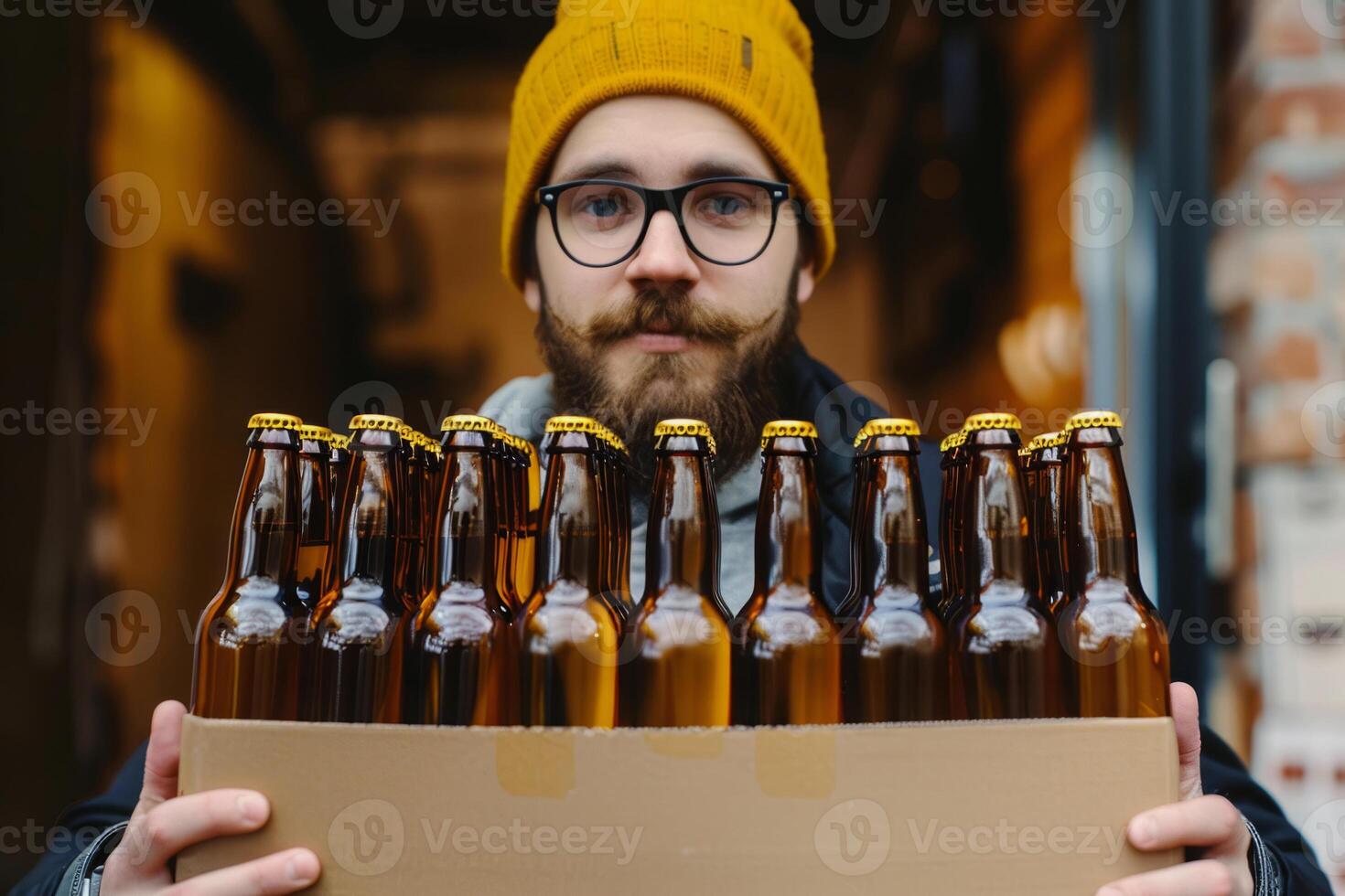 Happy Man Holding Case of Beer Bottles Outside Shop photo