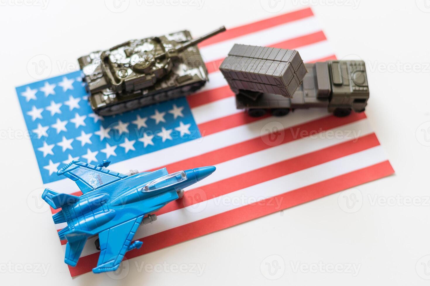 USA flag image photo with a combat plane, khaki green tank and military car standing on american flag