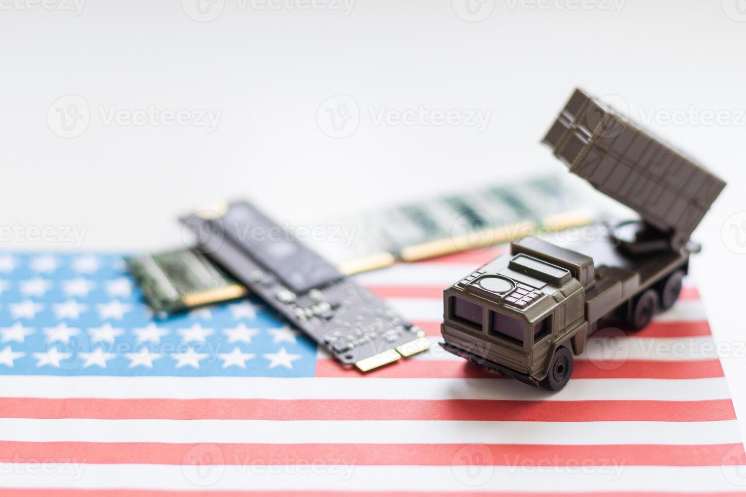 A toy military vehicle with a rocket and microcircuit photo
