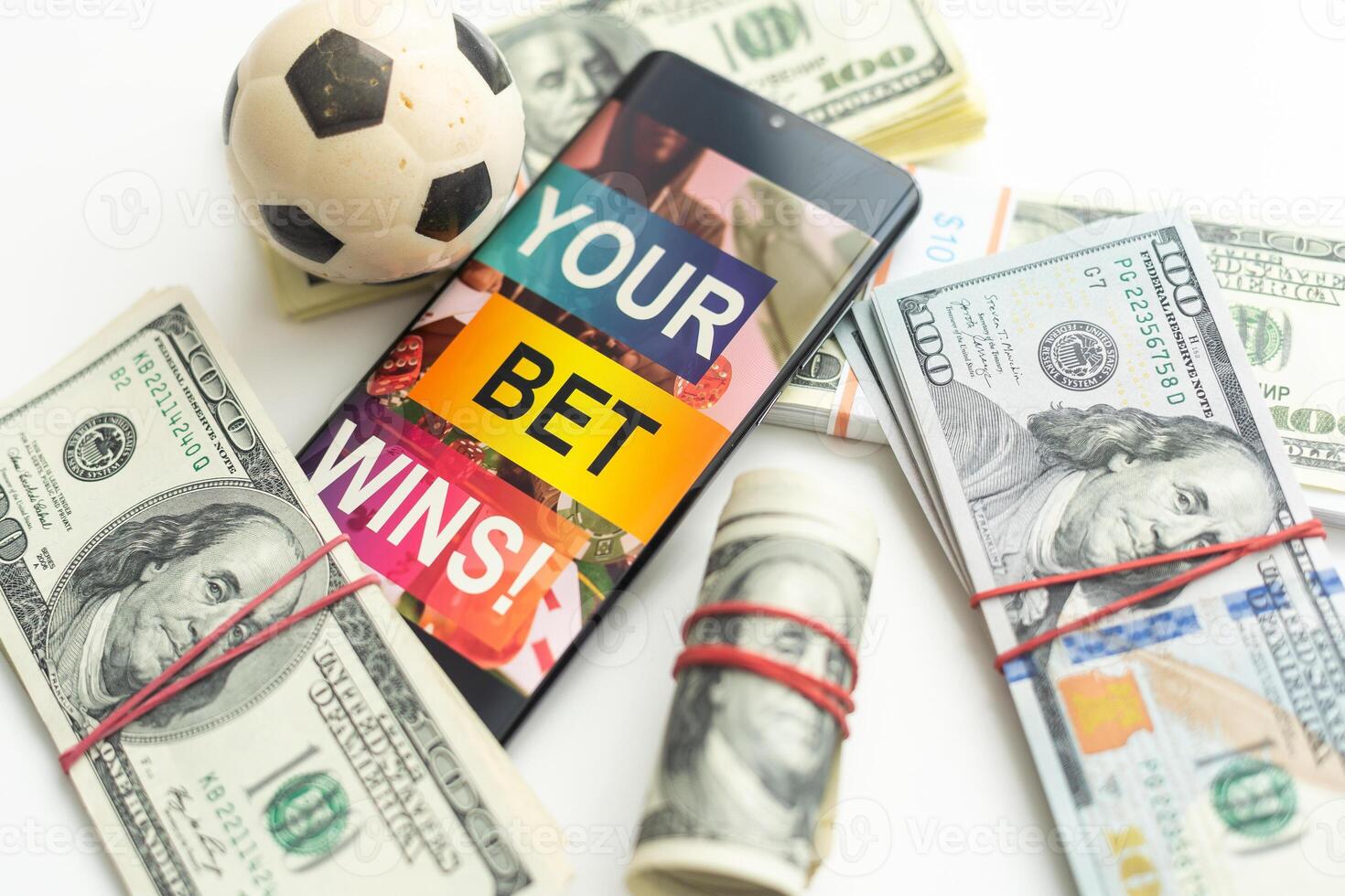 tablet pc with app for sport bets, on top of stacks of banknotes, white background, concept of online bets 3d render photo