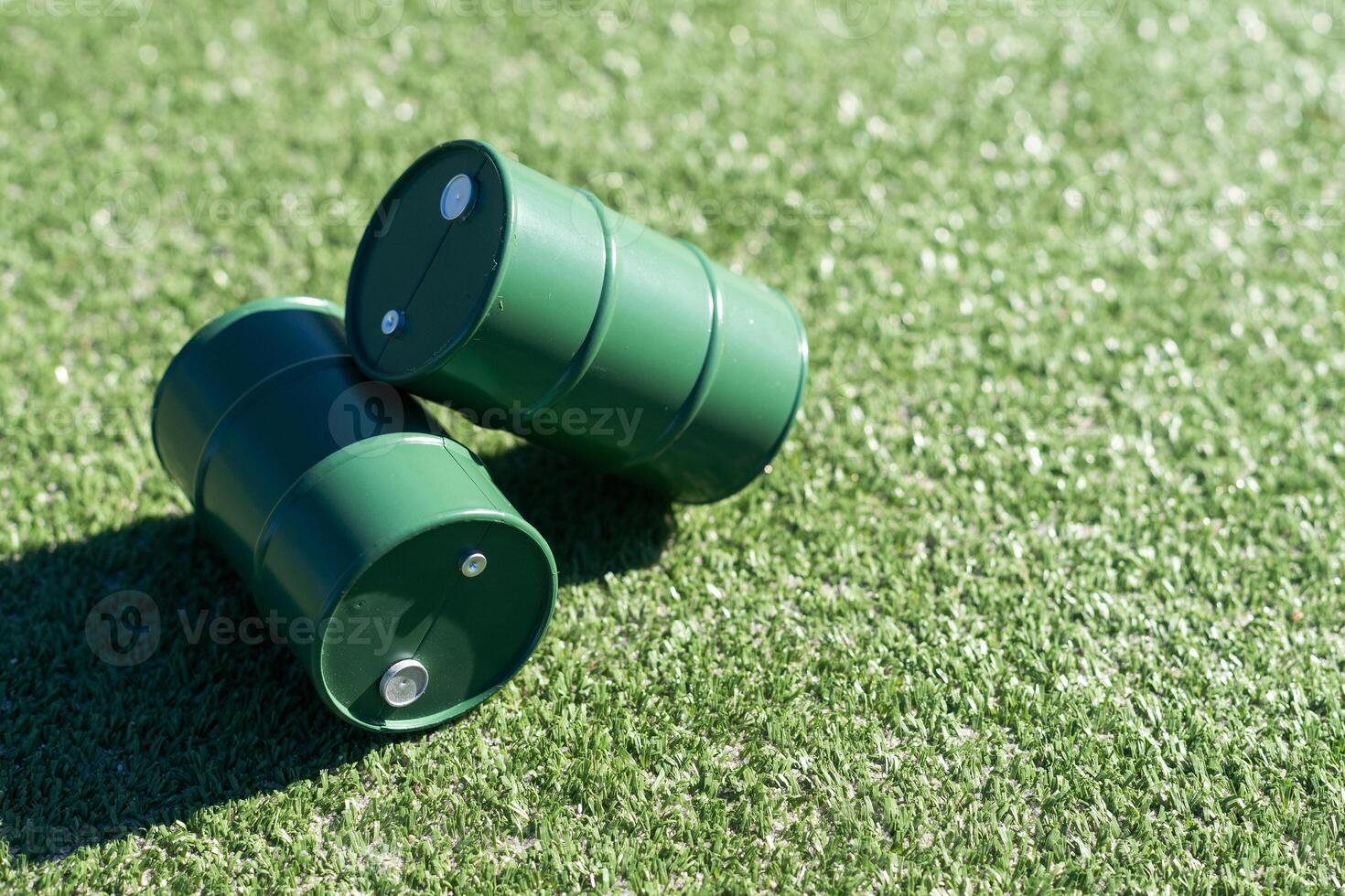 oil barrels on green background photo