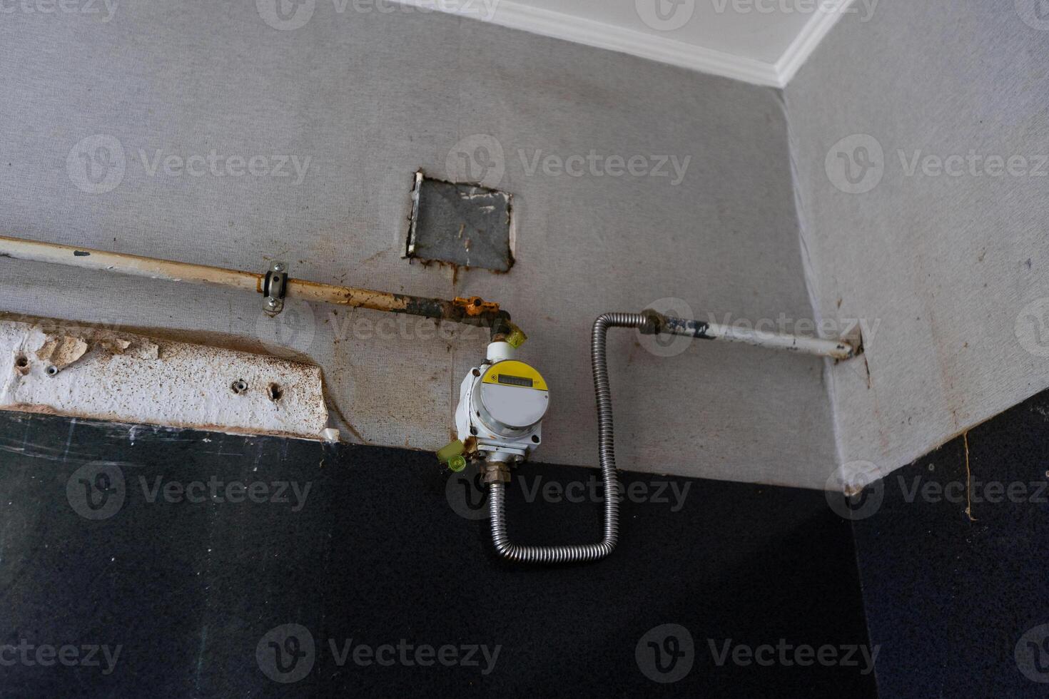 Gas valve on gas pipe at home. Concept natural gas savings in the heating season. photo