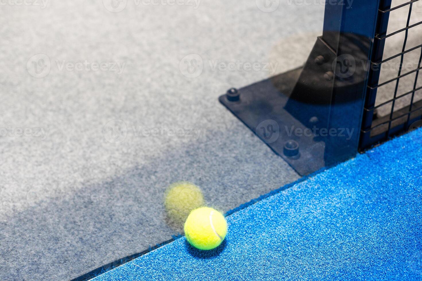 Paddle objects on blue turf photo