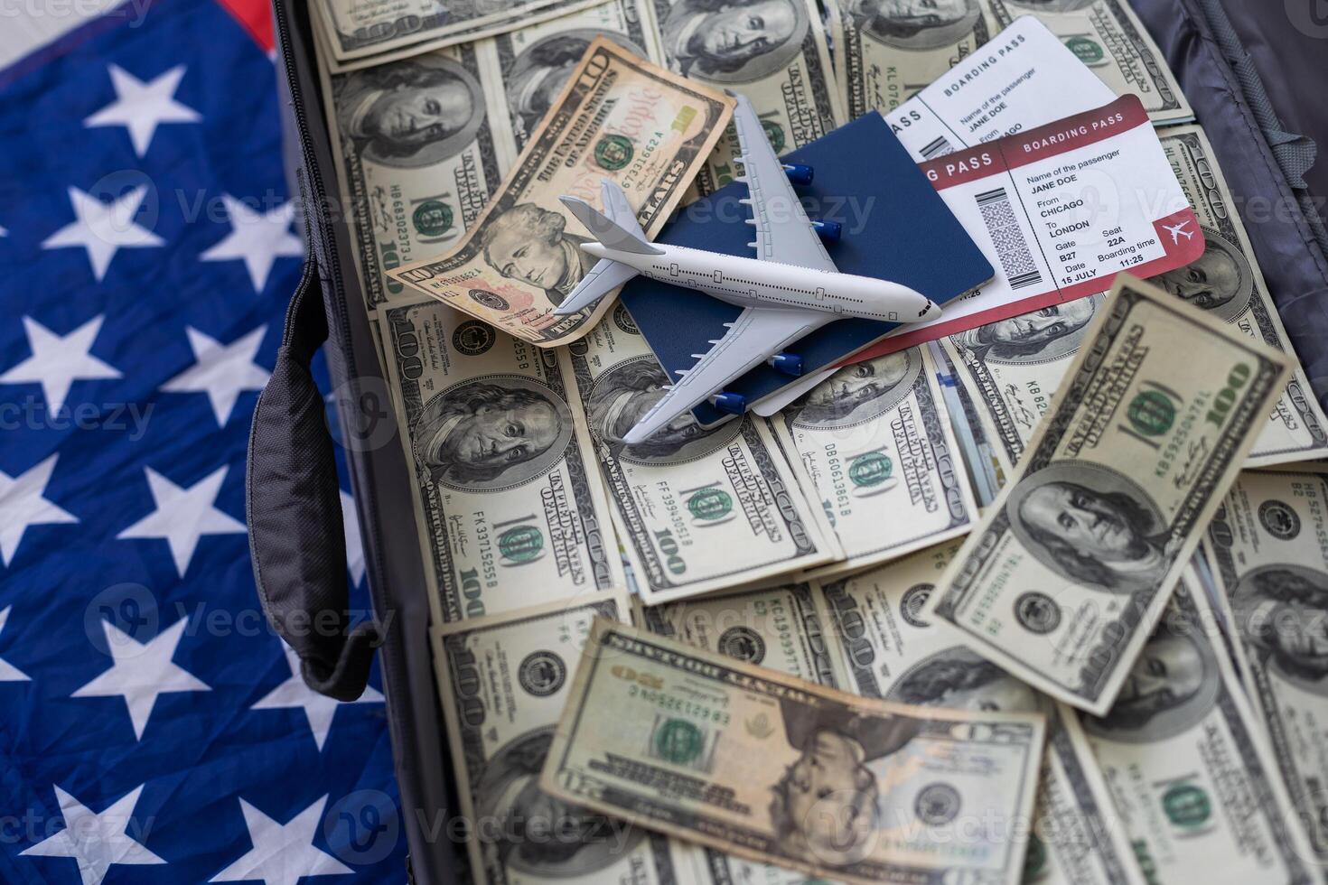 100 dollar bills in a suitcase photo