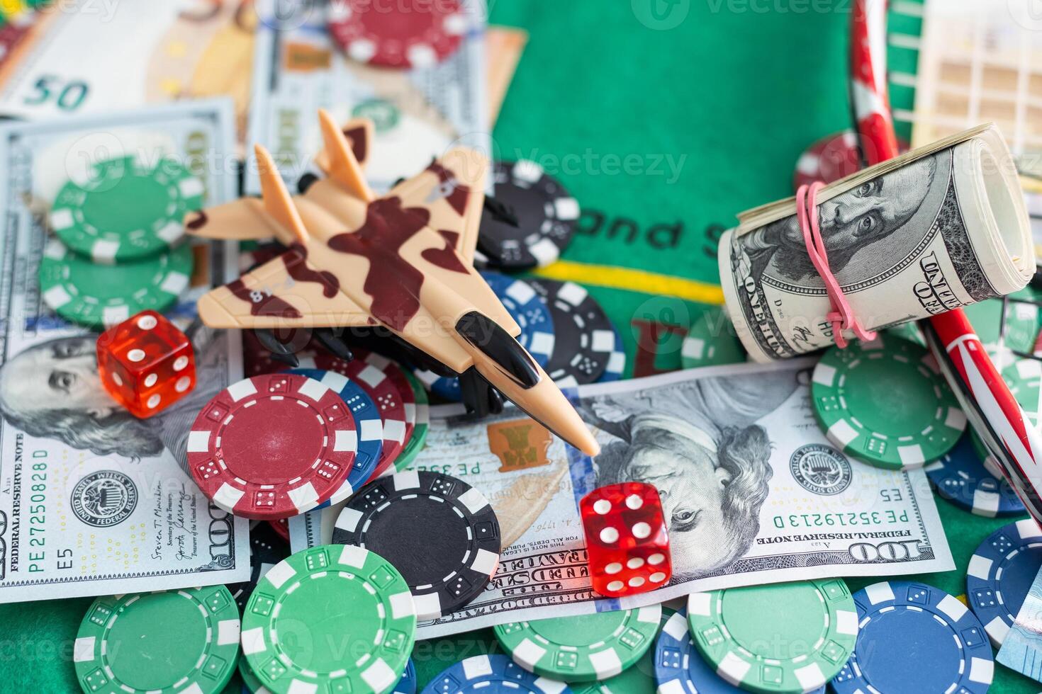 American money dollars and poker chips on casino table close up. photo
