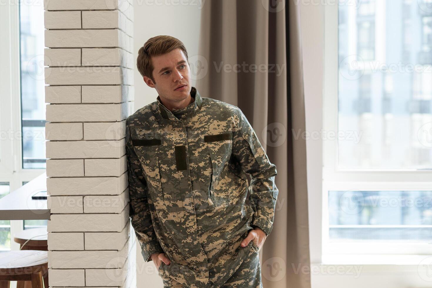 a military man in his thoughts photo